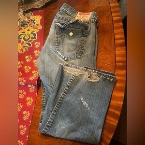 Distressed Men’s True Religion Jeans
